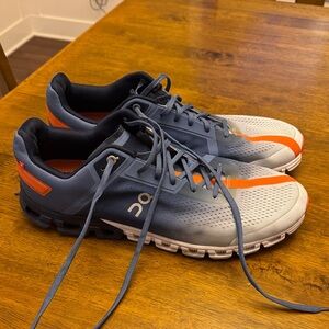 On Running Dynamic Gray and Orange Shoes